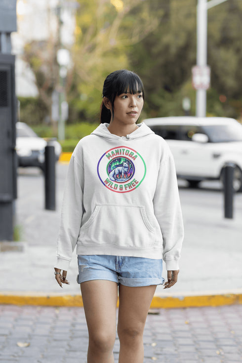 Unleash your wild side with our Manitoba – Wild & Free hoodie, featuring an enchanting graphic of an arctic fox beneath the dazzling northern lights.